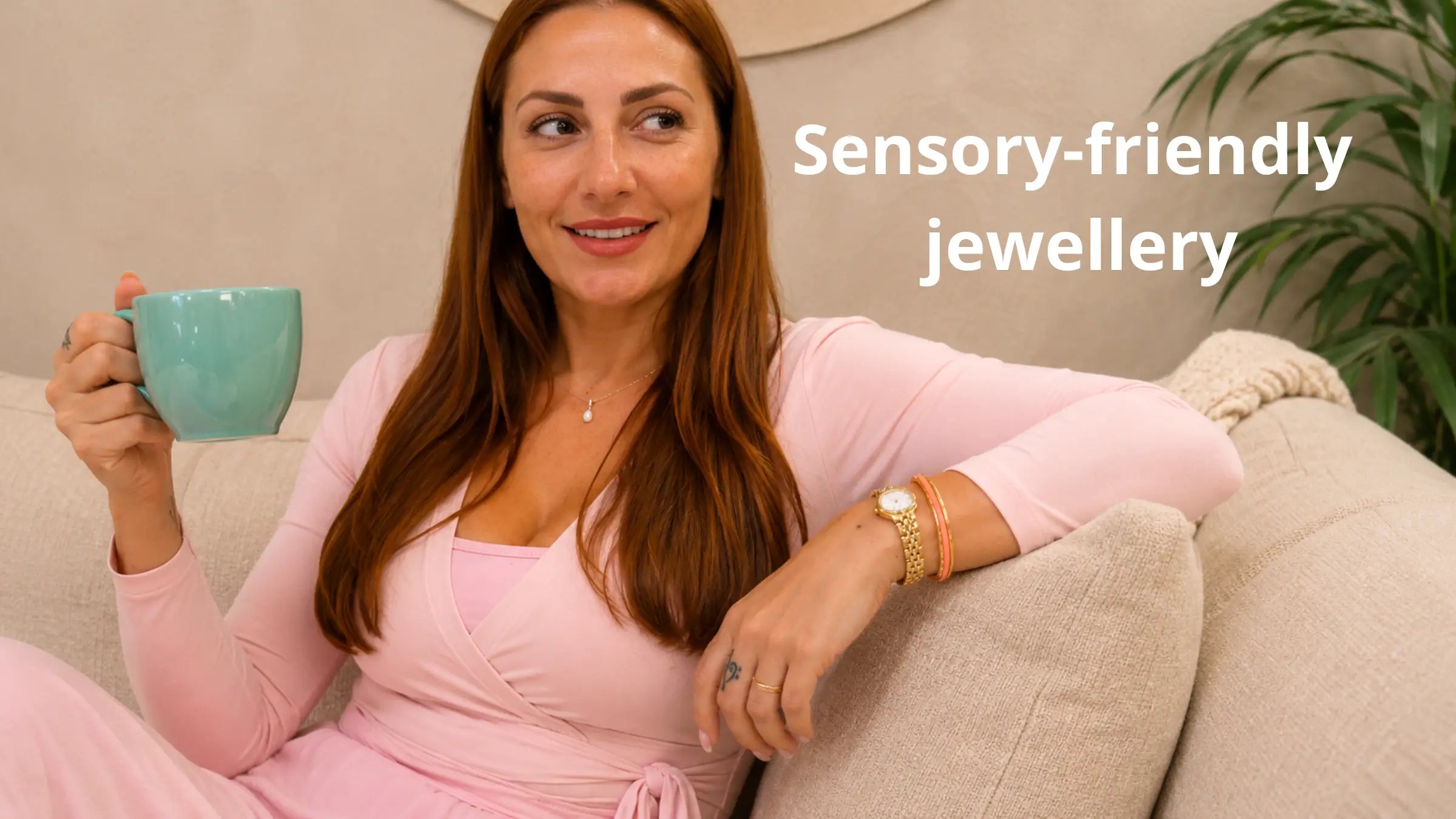 Lady sitting relaxed on a lounge with a gypsea loop hair tie bangle on her wrist explaining why Sensory-Friendly Jewellery for Neurodivergent Adults matter