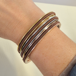 brown hair ties in a 3 stack of gypsea loop bangles, for brunette hair colour
