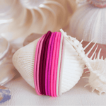 Flamingo Pink gypsea hair ties that pair with a Gypsea Loop Hair Tie Bangle
