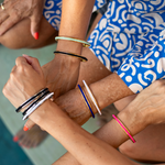 Gypsea loop hair tie bangles hold your hair tie for you so you have no more tight hair ties on your wrist. Available in Gold and Silver 