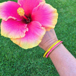 Gypsea Loop bangle with colourful hair ties tropical flower