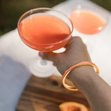 Cheers, Gypsea Loop Bangle is the new must have accessory, Gold hair tie bangle with orange hair tie