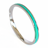 Silver Gypsea Loop bangle with blue hair tie