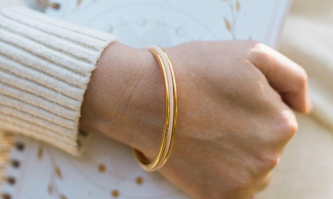 Cream hair tie in gold gyspea loop hair tie bangle from the earth hair tie pack